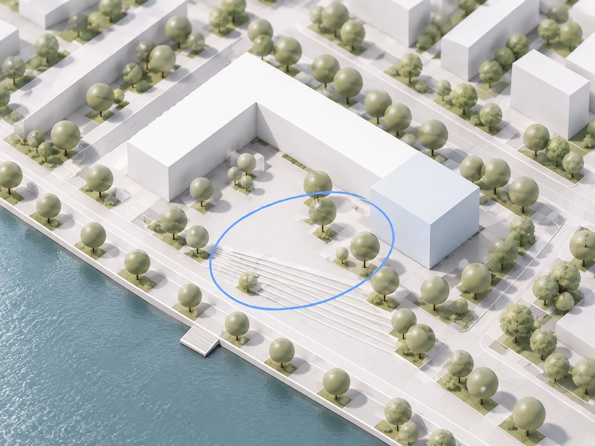 White massing study of the community center, with courtyard and waterfront annotations